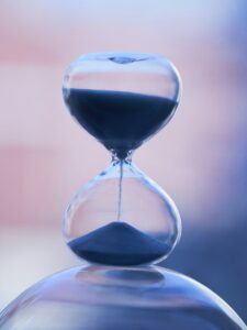 An image of an hourglass representing the passage of time.