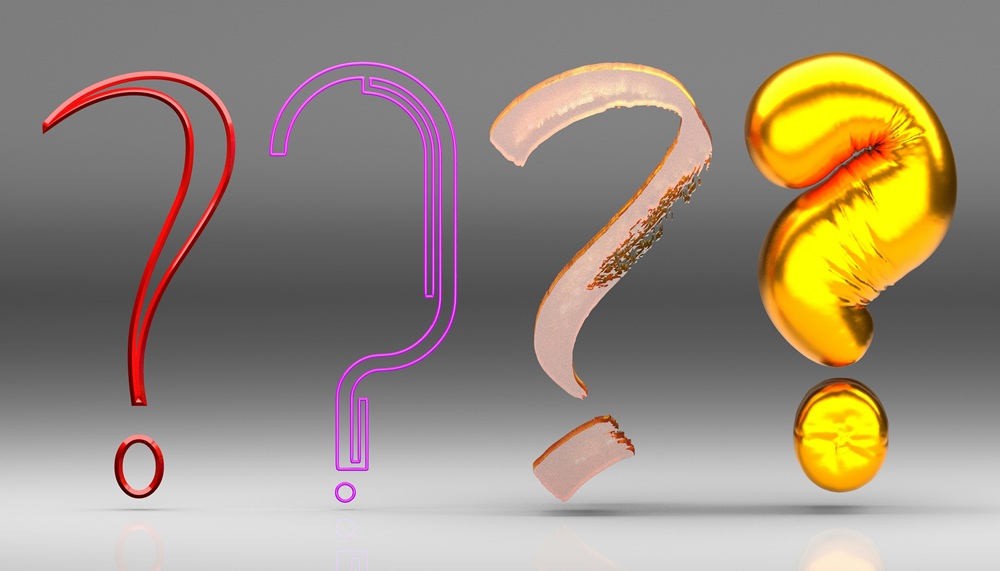 Four multi-coloured question marks by Buddha Elemental 3D to represent support queries