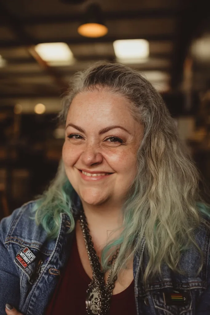Carolyn smiling to camera