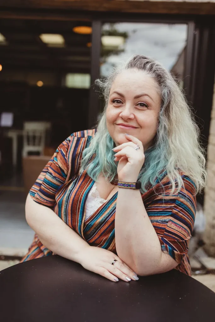 Carolyn smiling to camera