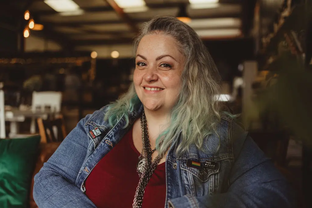Carolyn smiling to camera